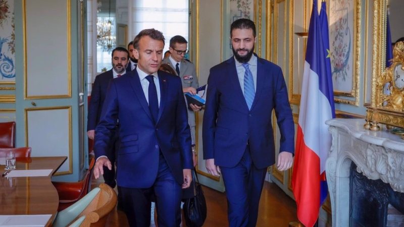 Macron hosts Syria's de facto president and ex-Qaeda leader at Elysee