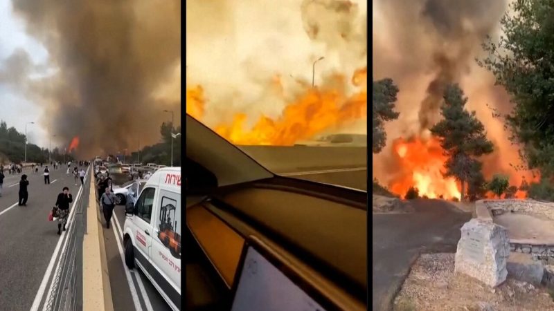 Israeli regime's firefighters struggle to contain blazes