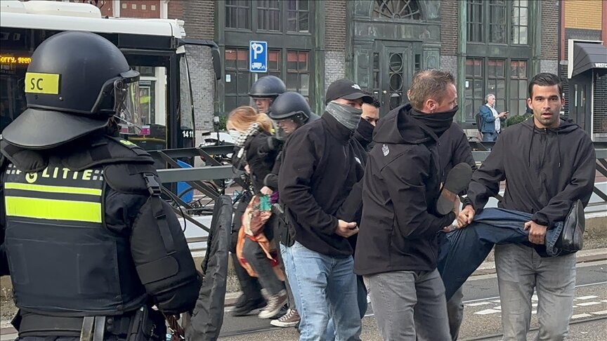 Dutch police arrest pro-Palestine protesters at WII anniv.
