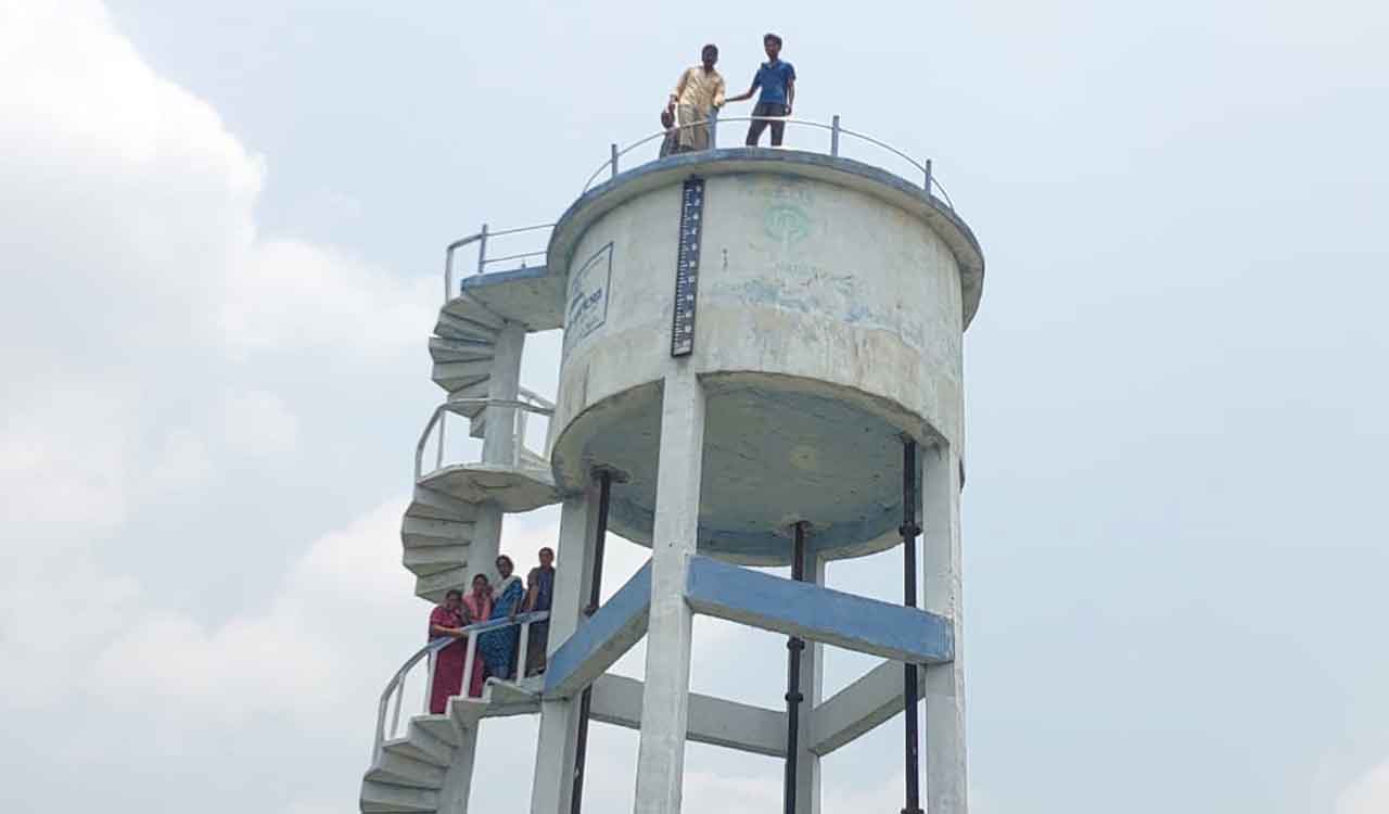Indiramma houses: Villagers stage protest on water tank alleging irregularities in Kothagudem