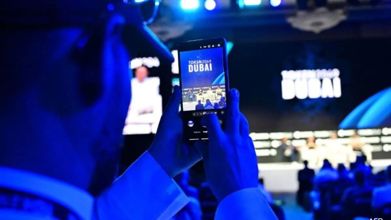 Inside World's Largest Crypto Event: Giant Whale Mascots, Zipline Rides