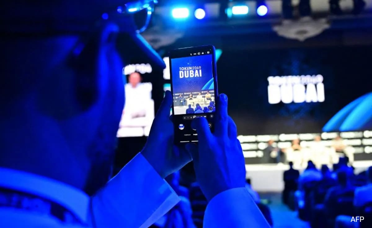 Inside World's Largest Crypto Event: Giant Whale Mascots, Zipline Rides