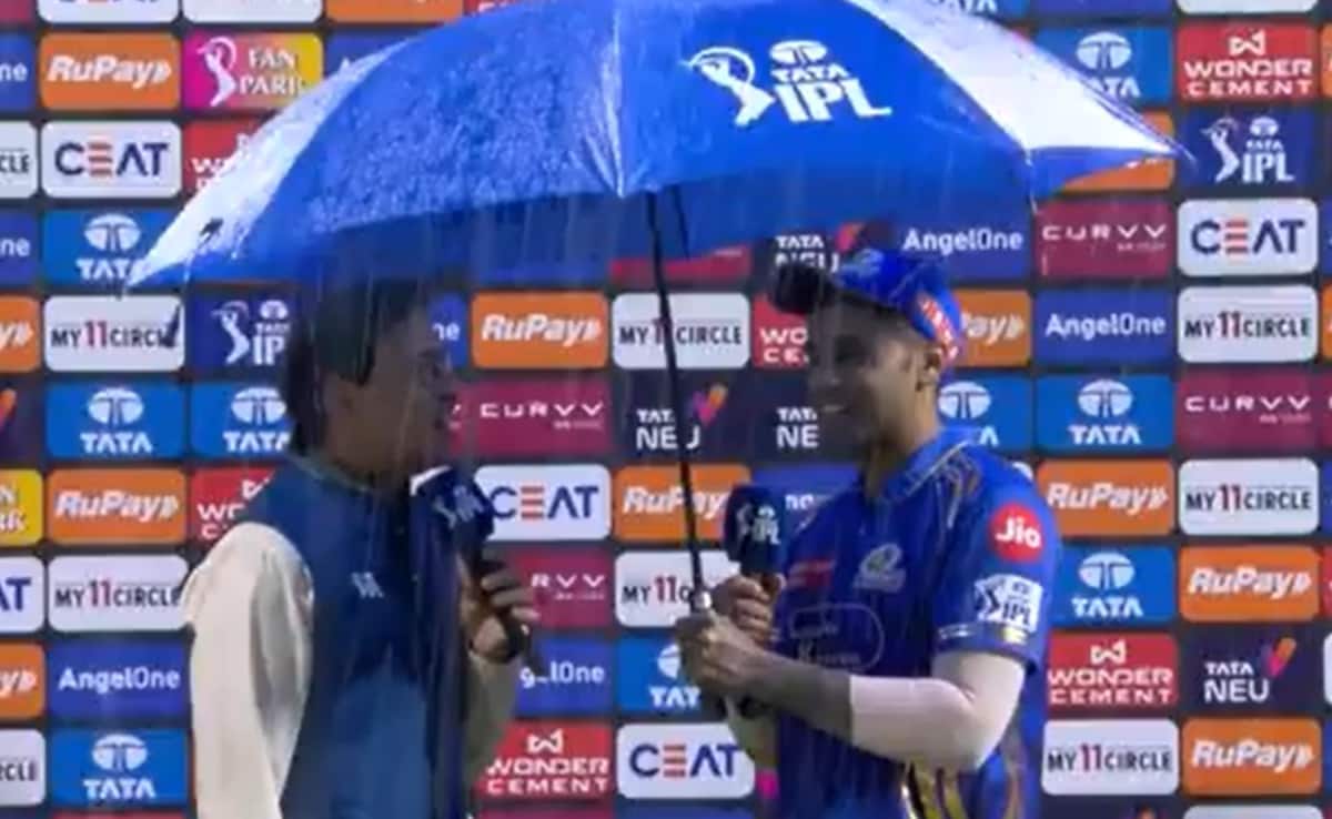 Watch: SKY Offers Umbrella To Bhogle Amid Heavy Rain. Internet In Awe